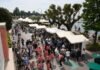 Stand e visitatori lungo il lungolago di Bardolino per Olivum 2026 olio Garda Dop