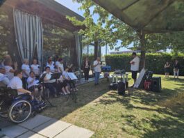 Il coro D’AltroCanto di Anffas Desenzano sul palco di ExpoAid 2026 Coro Anffas