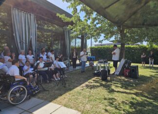 Il coro D’AltroCanto di Anffas Desenzano sul palco di ExpoAid 2026 Coro Anffas